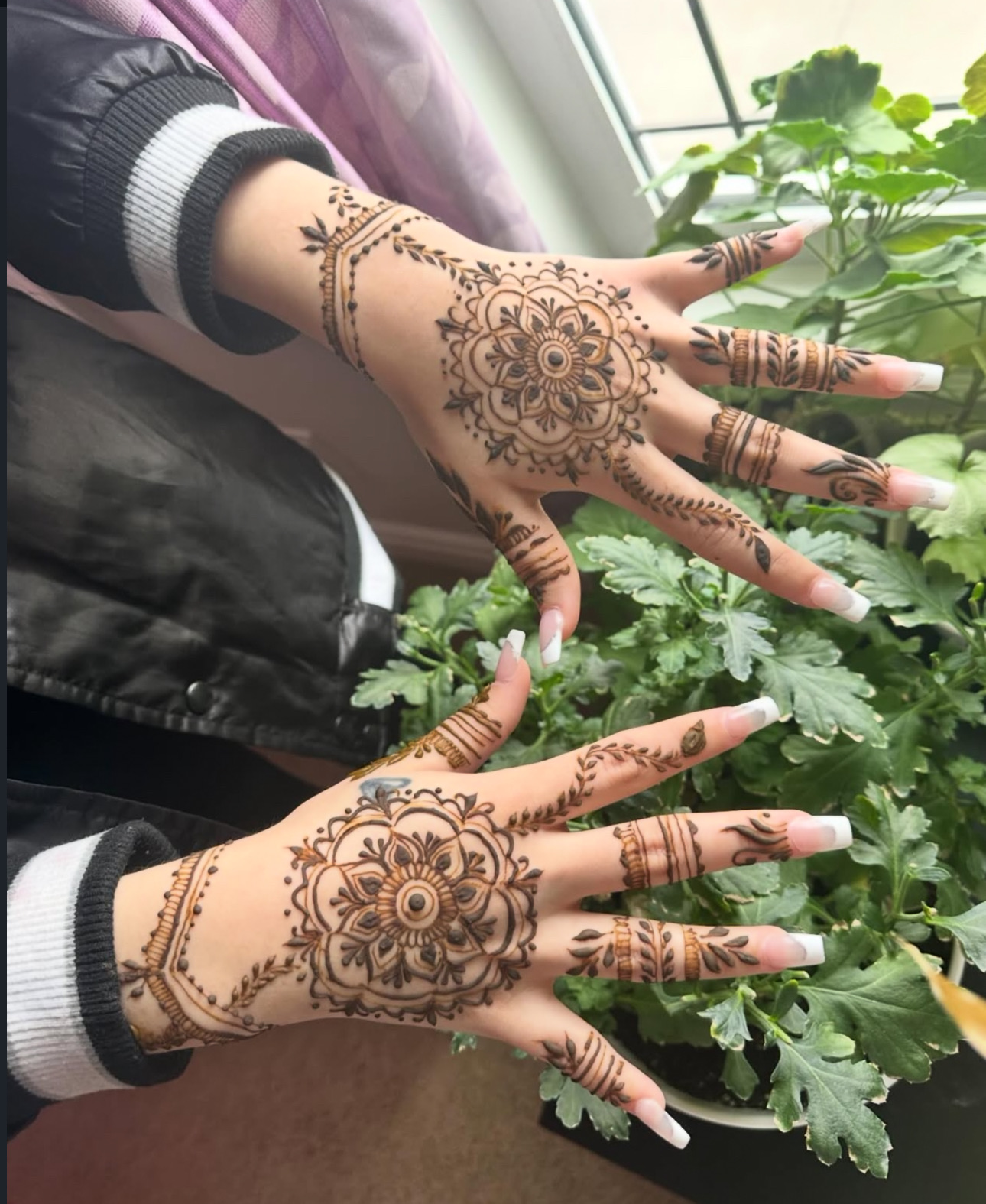Matching mandala henna hands Edmonton artist